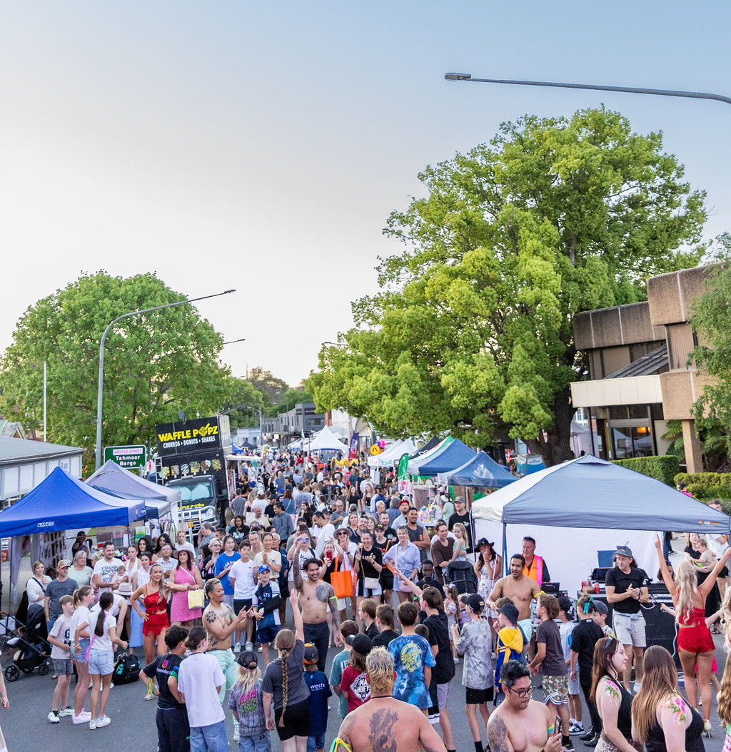 Crowds gathered around street entertainment and market stalls