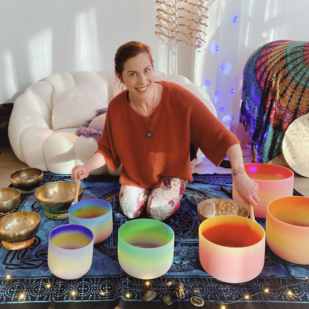 Natalie playing with crystal and Tibetan singing bowls.