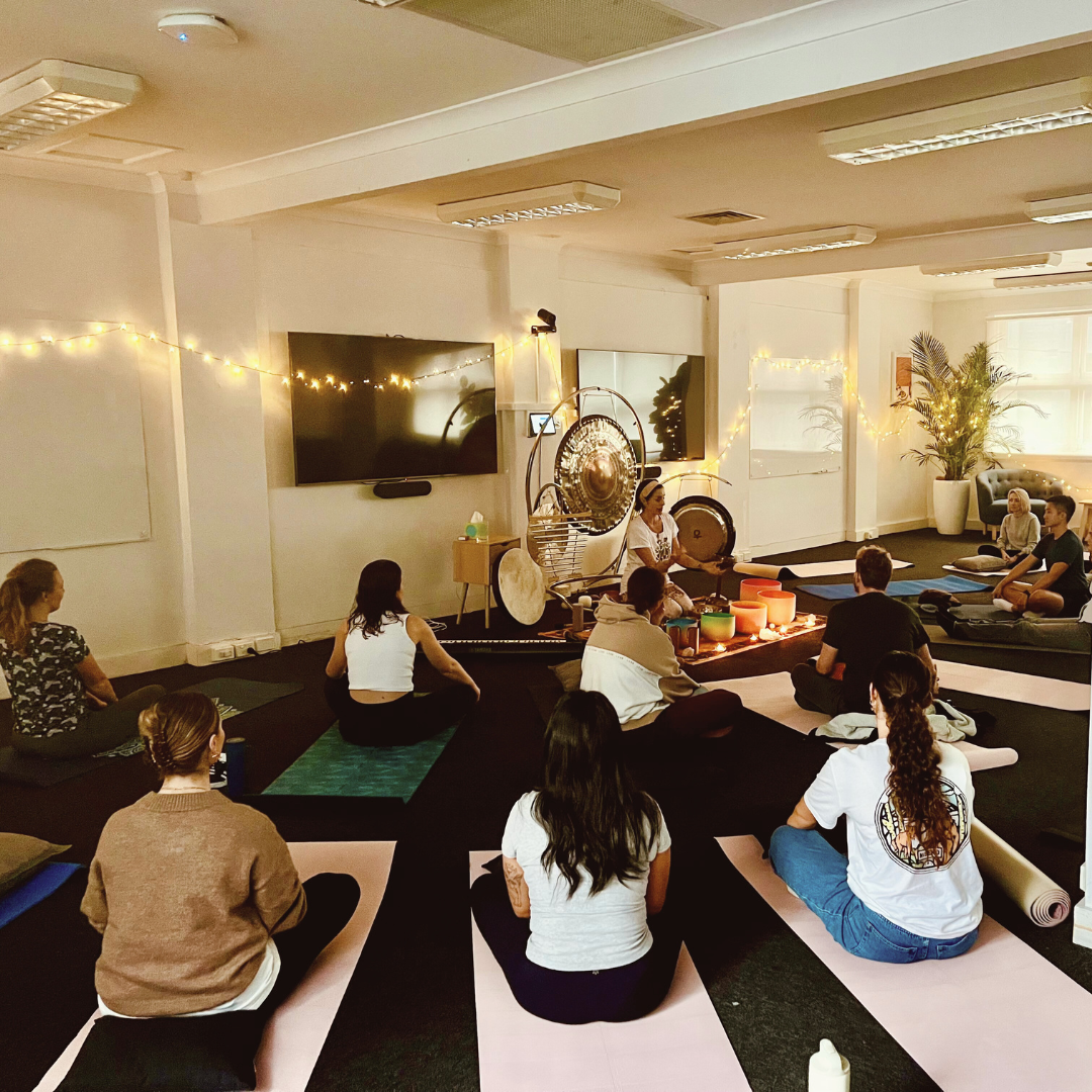 Image of Natalie Grace leading a corporate wellness session.