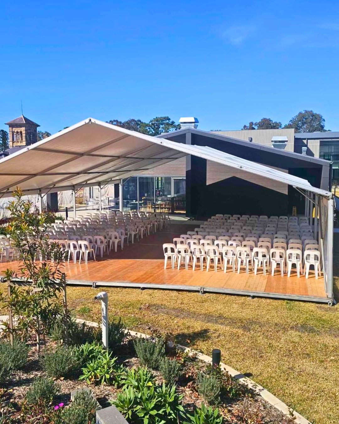 20m Framed Marquee with white plastic chairs