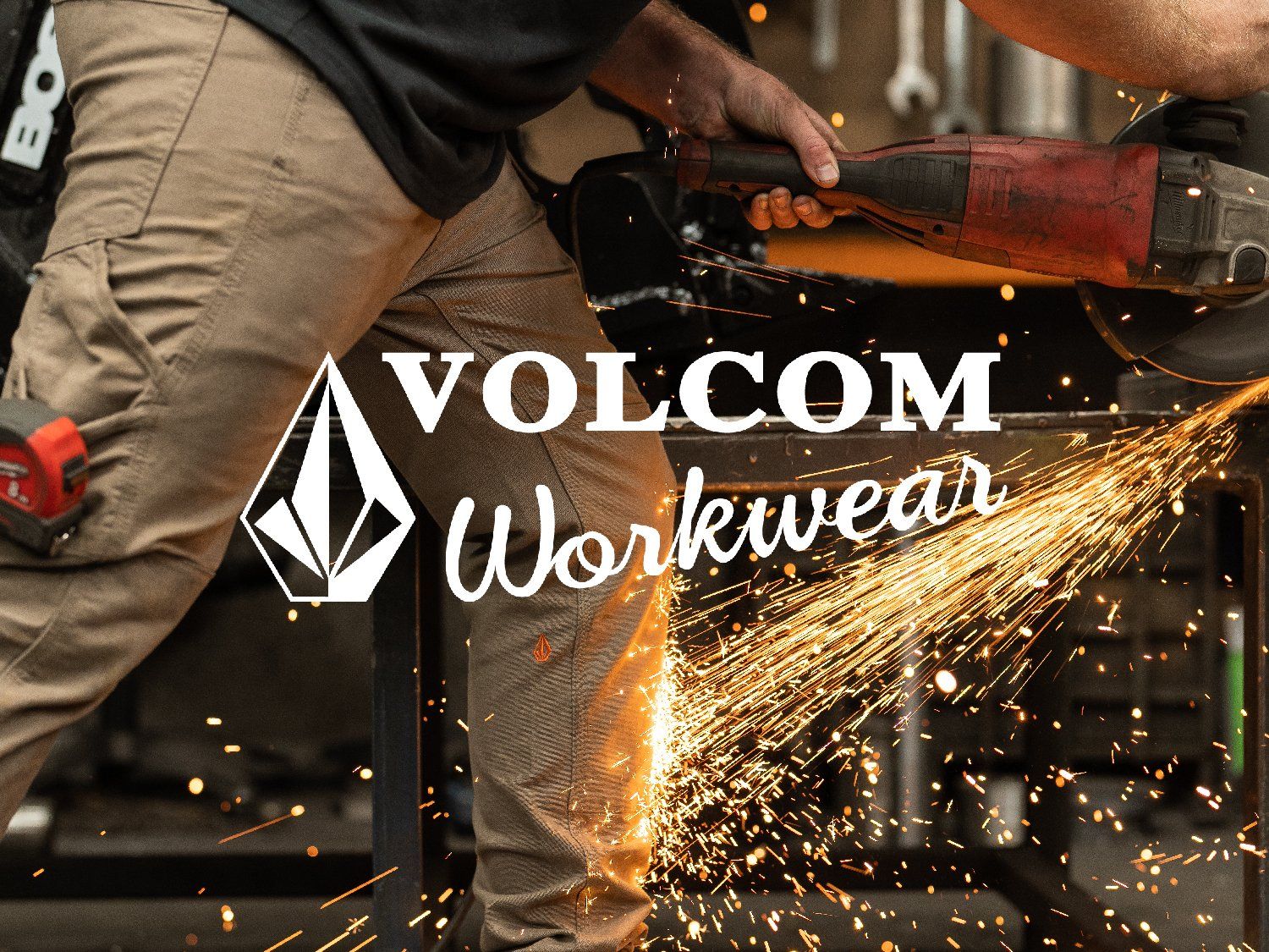 Worker using a power tool with sparks flying, wearing Volcom Workwear. Logo and text overlaid on the image.