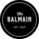 Black circular logo with "The Balmain" in bold white font and "Est. 1869" beneath it.