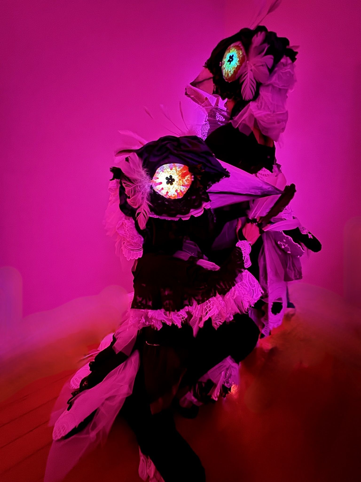 Magical Magpies posing in pink lighting ready for shenanigans