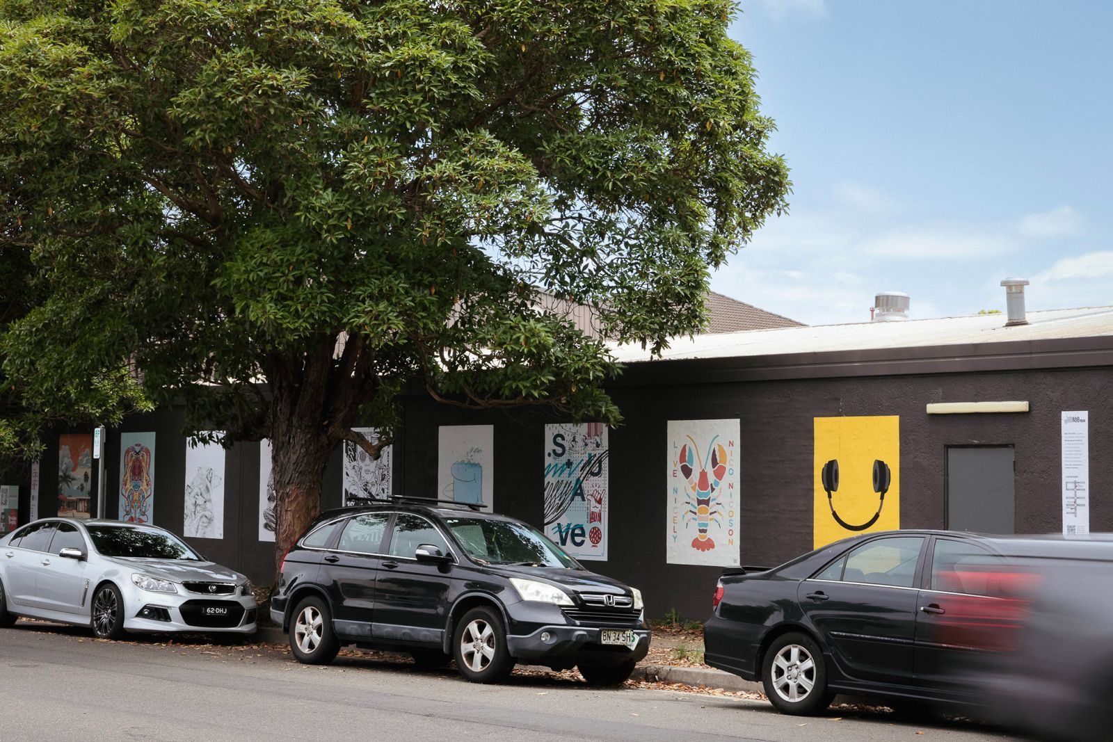 A view of BAD Poster street gallery along Mitchell Rd, Brookvale Arts District