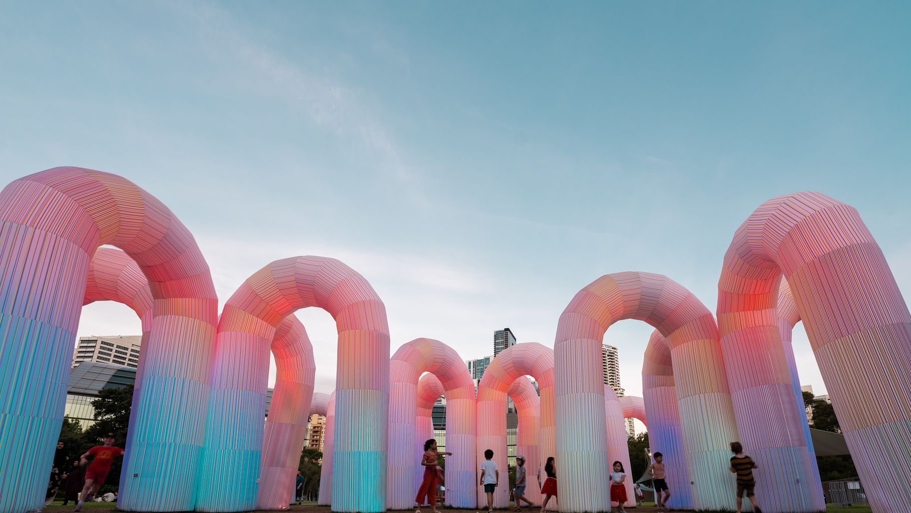 Twilight image of people around an inflatable light installation at Darling Harbour