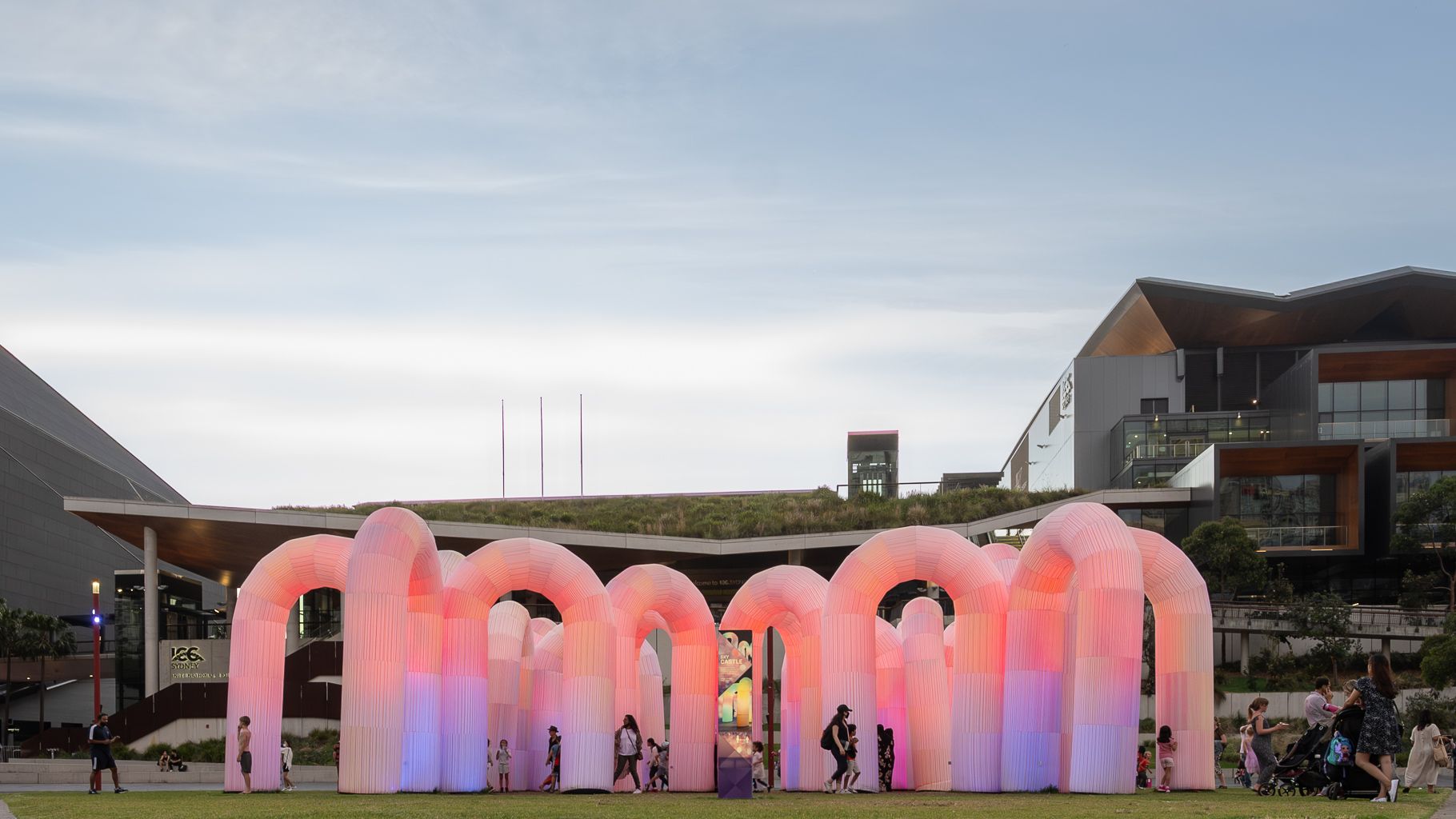 Twilight image of people around an inflatable light installation at ICC Sydney