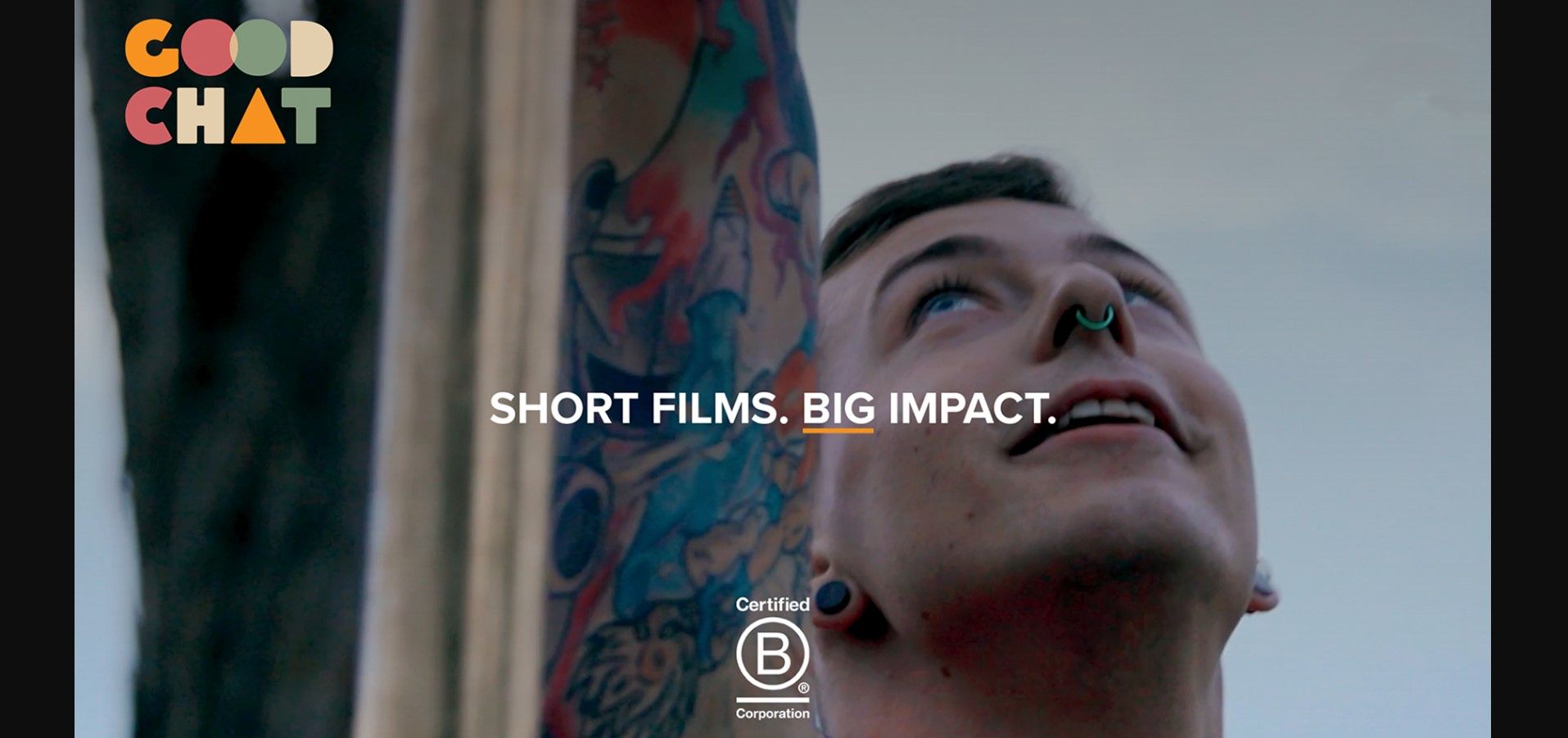 Person with tattoos looking up, text above reads "SHORT FILMS. BIG IMPACT." Logo and certification shown below.