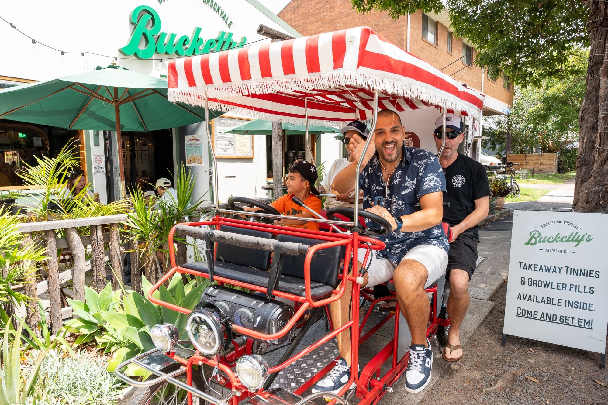 People riding the Brookiefest Tuk Tuk