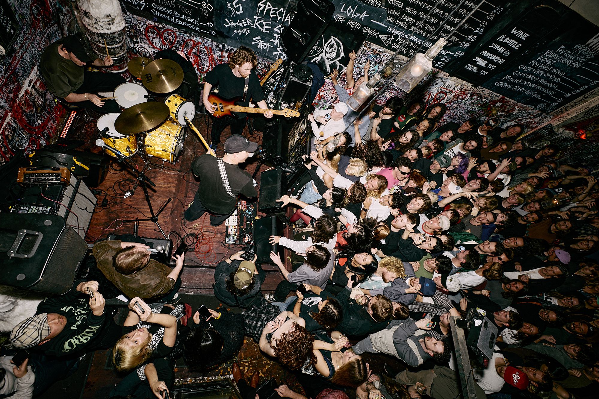 Ariel shot of Shady Nasty playing at the very grungy looking Marys Burgers