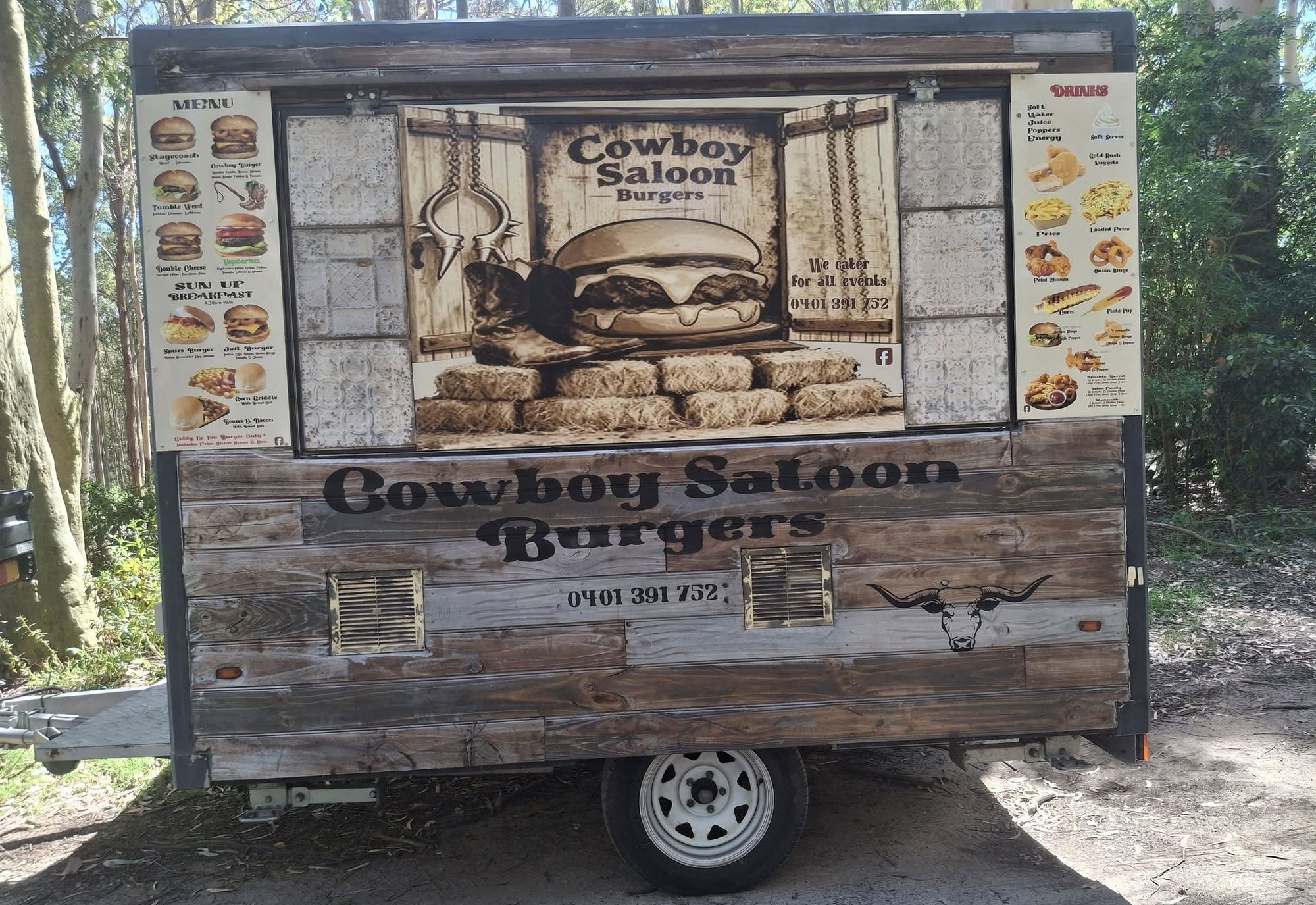 Cowboy Saloon Burgers logo