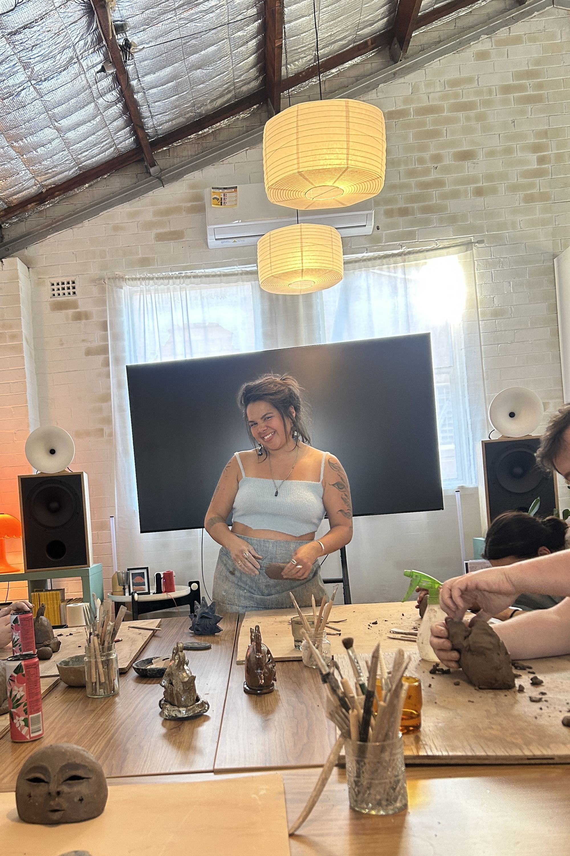 Manu teaching at her studio's workshop space in Marrickville