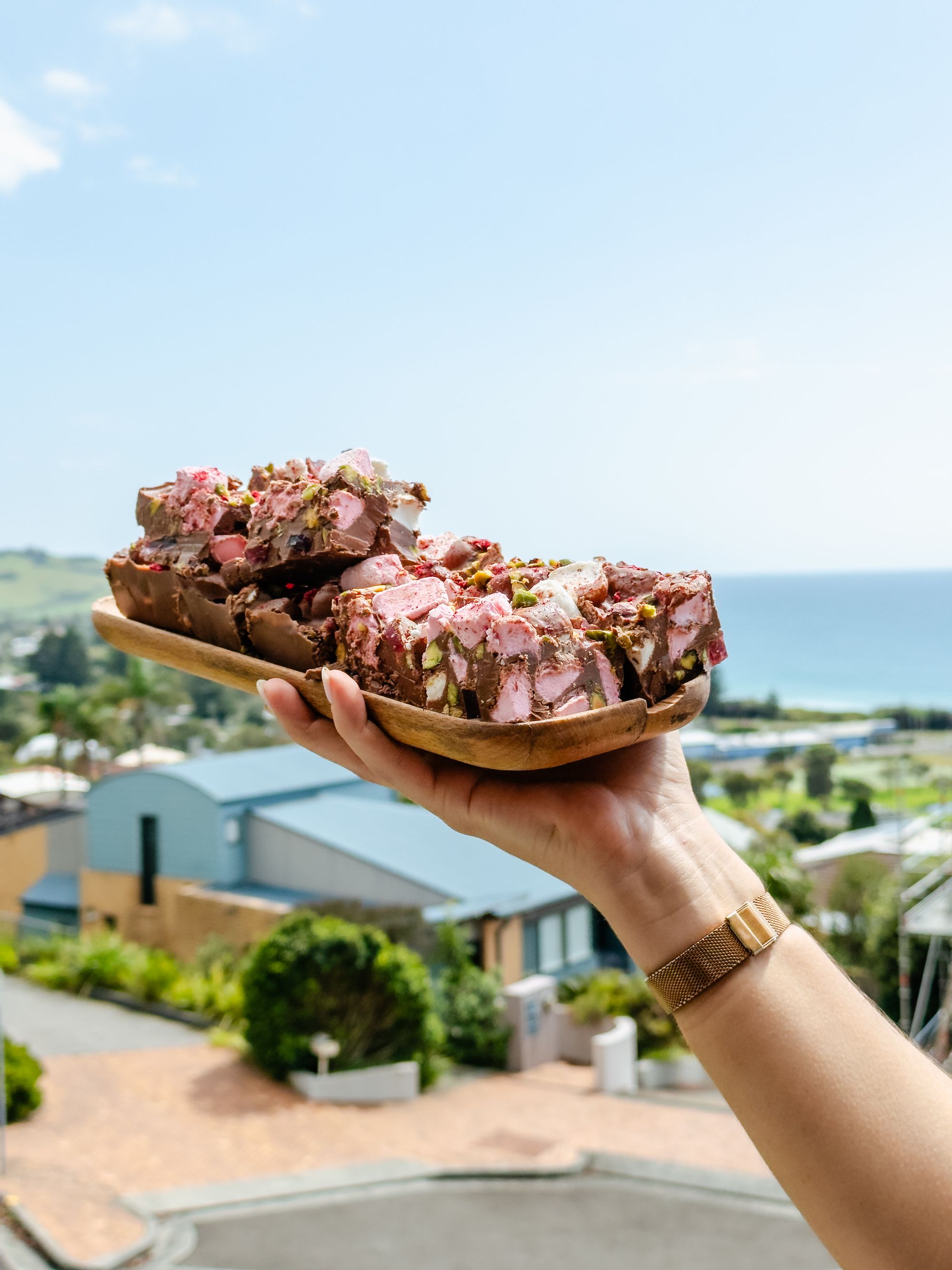Dessert held in front of view