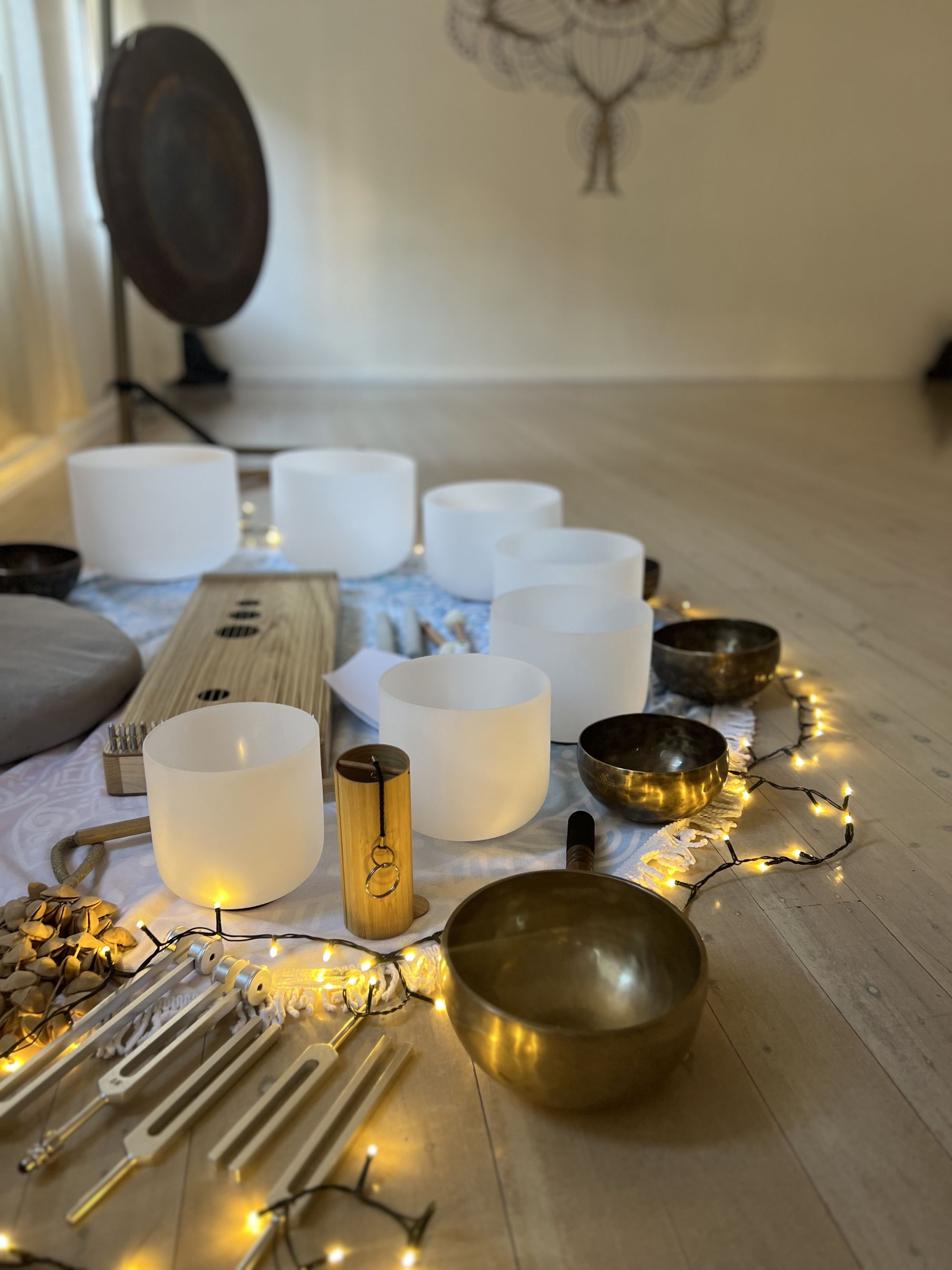 Crystal bowls, gongs, Singing bowls and other insturments ready for a sound bath
