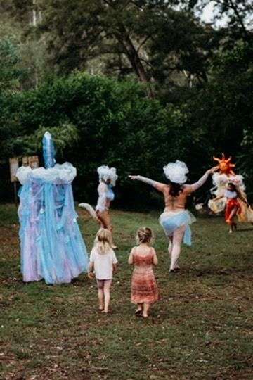Celestial Beings frolicking at Ember Collaborative Festival with kids