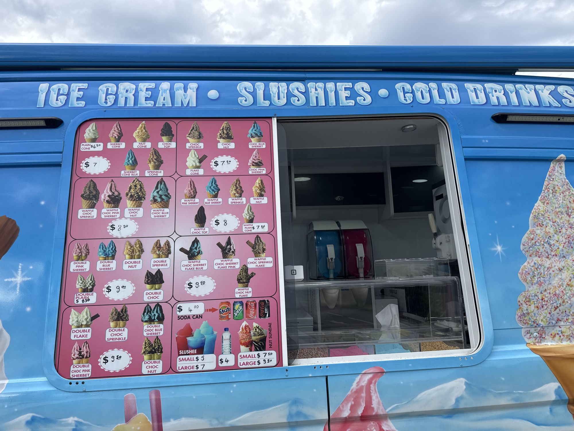 Ice cream van serving ice cream, milkshakes and slush drinks