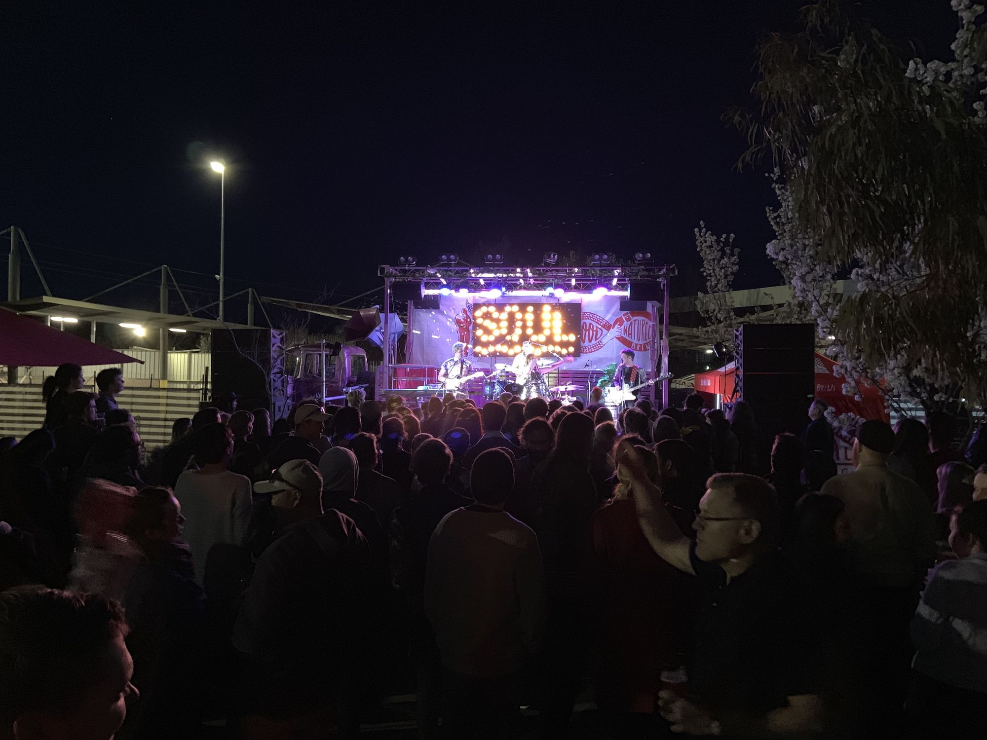 Soul Defender Celebrating Capital Brewing's 2nd Birthday party at night with crowd