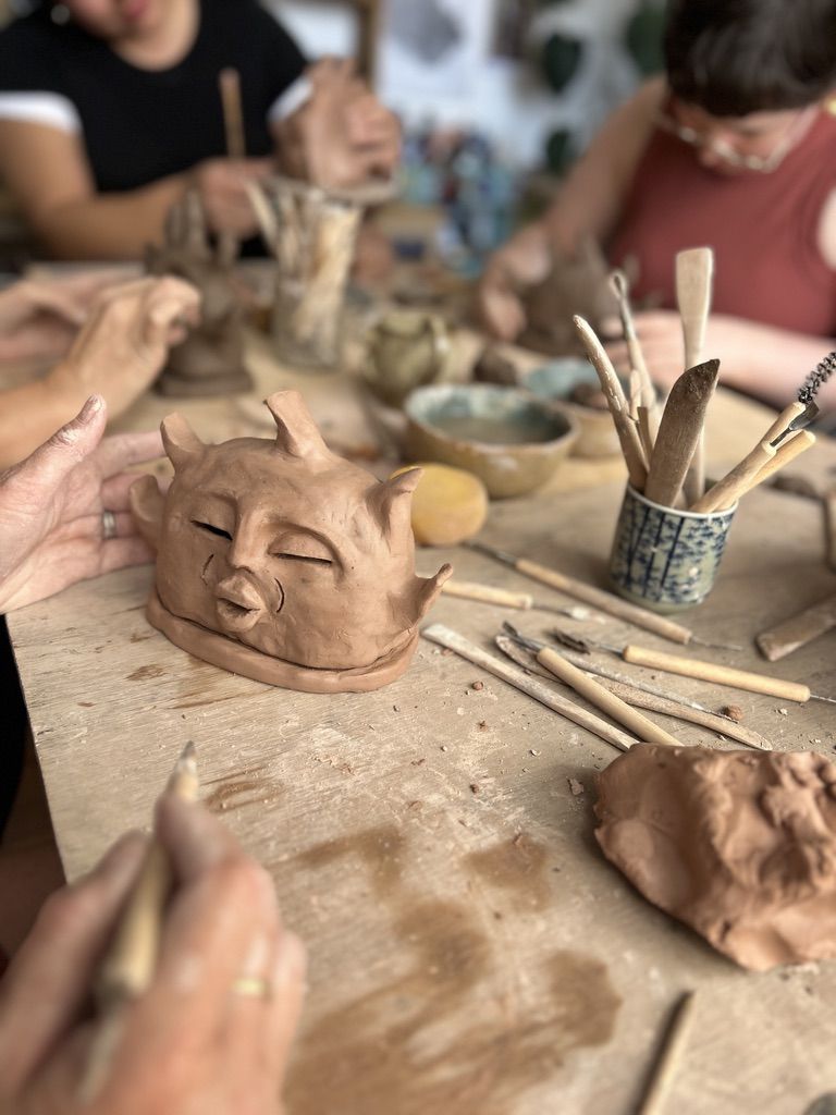 Students working on their pieces during an incense burner workshop