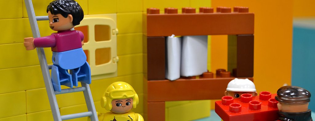 Family motorhome trip: Autumn leaves frame a campervan parked near a scenic lake.