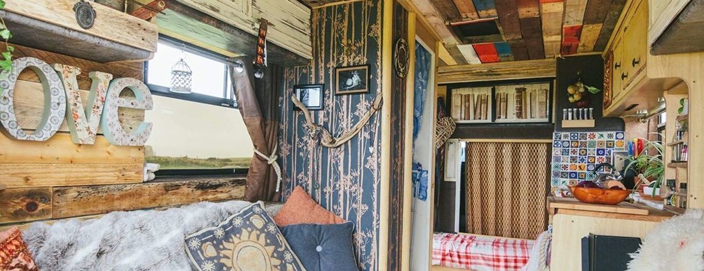 Colourful campervan parked up on a scenic hillside, ready for a UK road trip adventure.