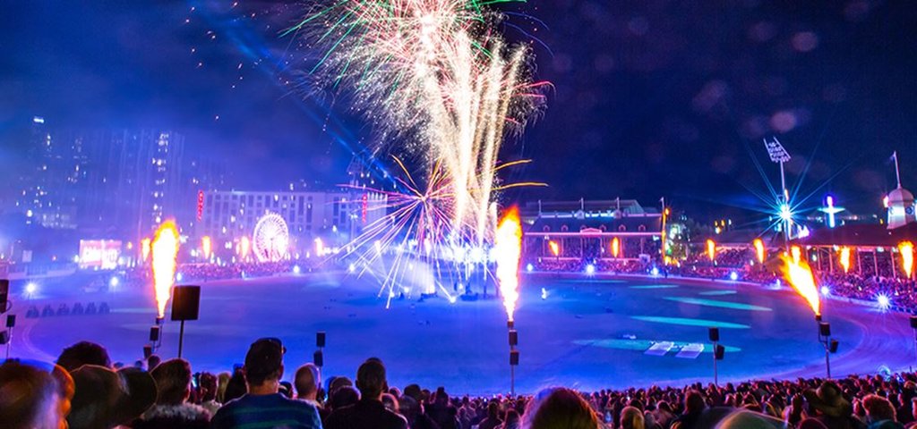 Family camping under the stars in the Queensland outback. Tents, 4WD and campfire.
