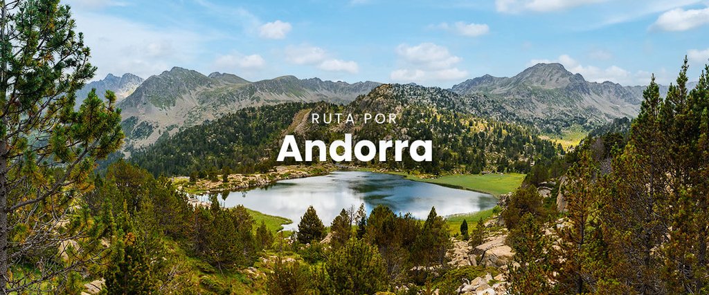 Autocaravana en Andorra con montañas nevadas al fondo, disfrutando de la naturaleza.