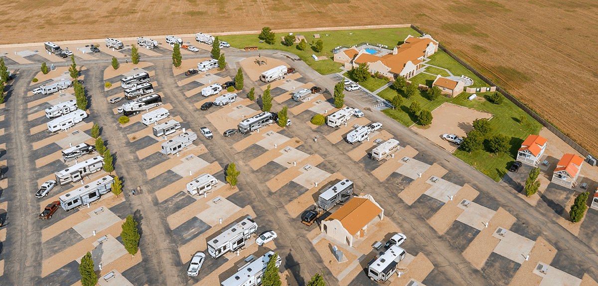 Static caravan at a sunny caravan park, ideal for family holidays and rentals.