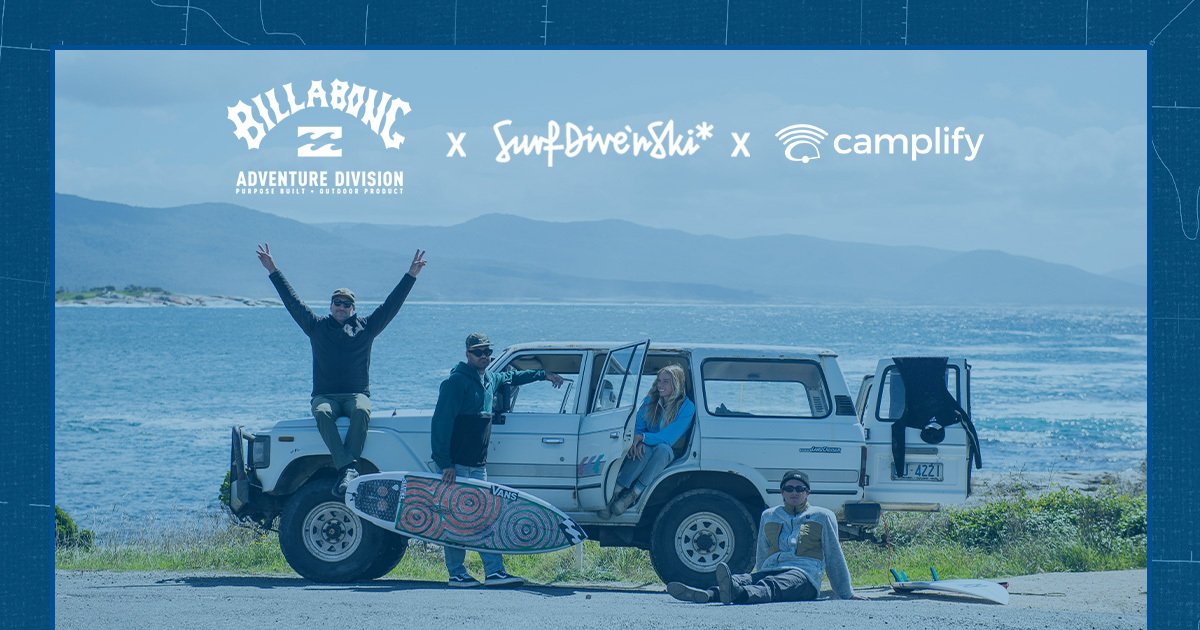 Couple camping in Tassie wilderness. Win a winter adventure trip!