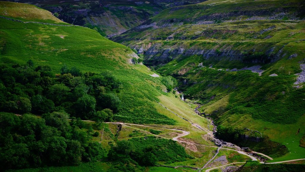 Campervan parked at scenic campsite in the Yorkshire Dales National Park.