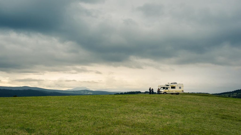 Tent pitched in a scenic British campsite, embodying responsible camping and the Countryside Code.