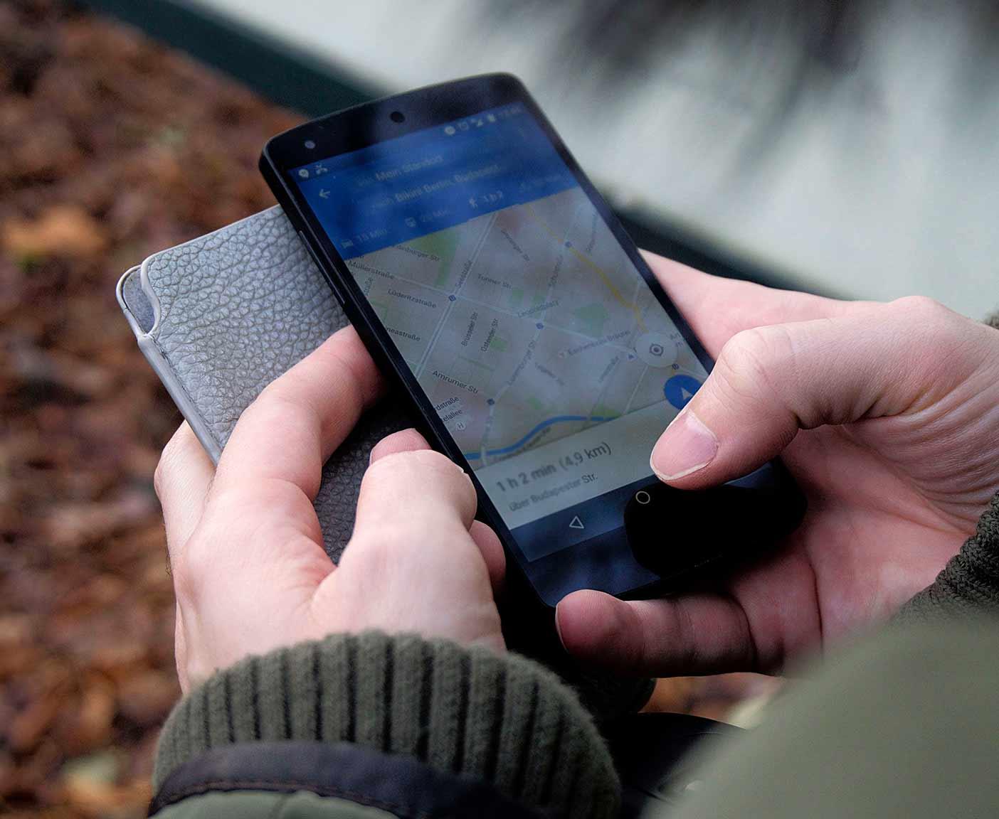 Tent pitched in a scenic campsite, suggesting apps for planning a stress-free camping holiday.