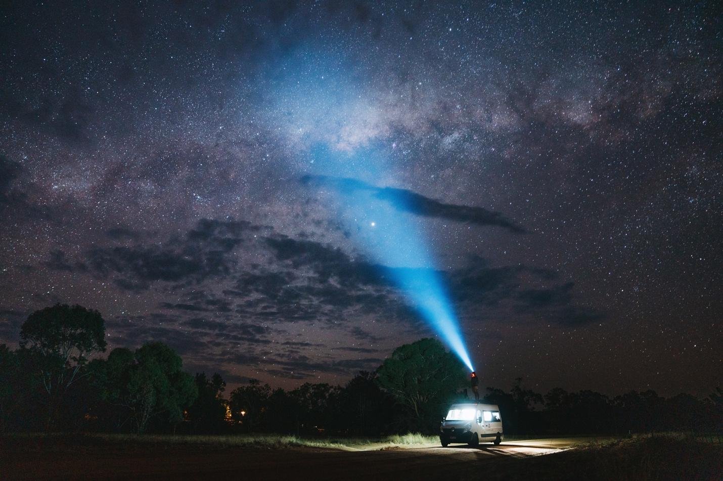 Campervan under the stars in the Warrumbungles, NSW. Road trip adventure in the Aussie outback.