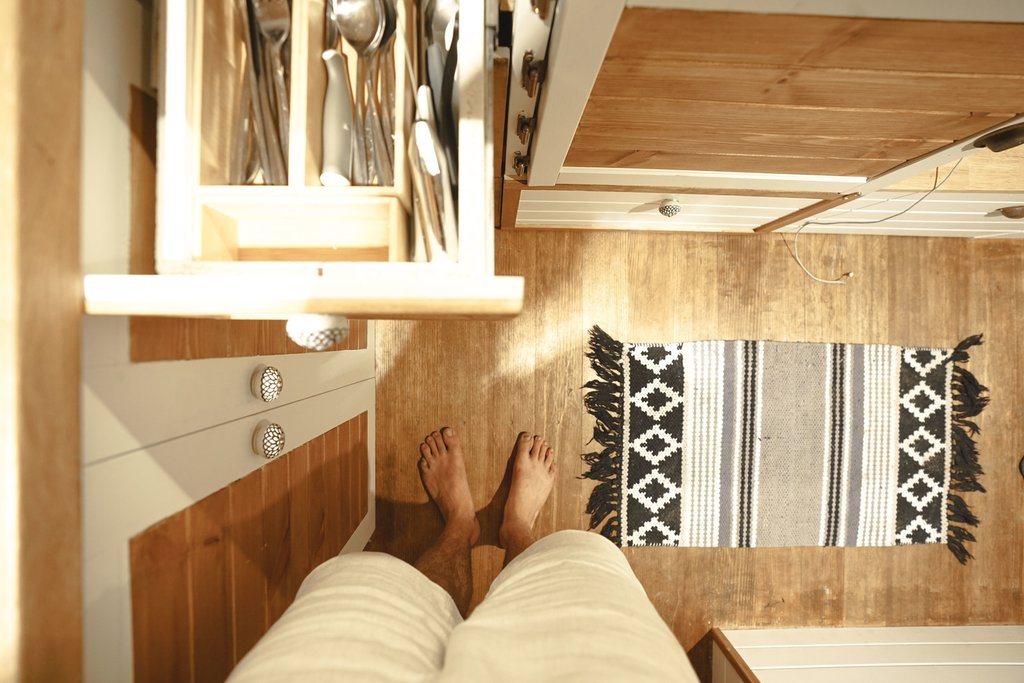 Campervan interior with timber flooring, ready for an Aussie road trip adventure.