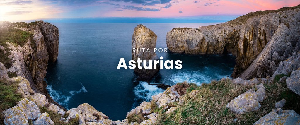 Autocaravana en paisaje asturiano con montañas y mar. Vacaciones y camping en naturaleza.