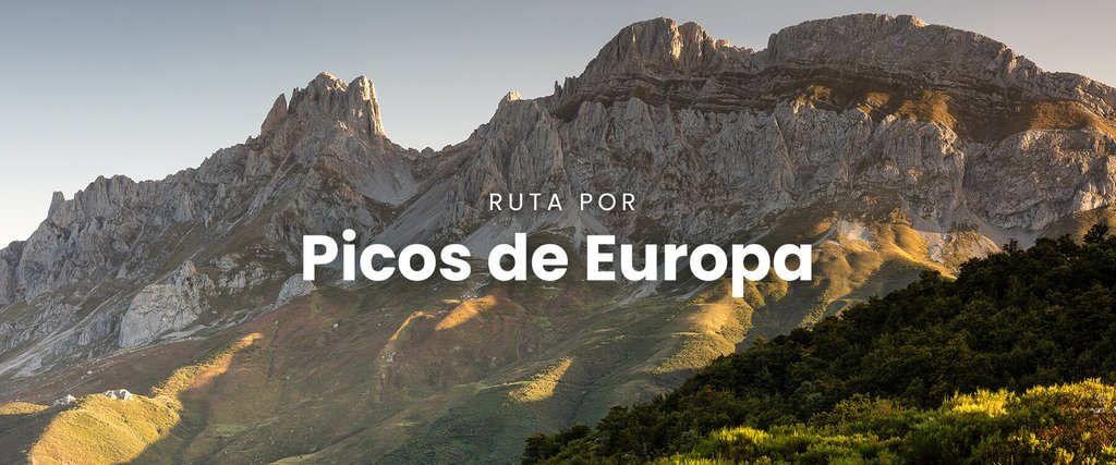 Autocaravana en Picos de Europa con vistas a montañas y cielo azul. Excursión y aventura camper.