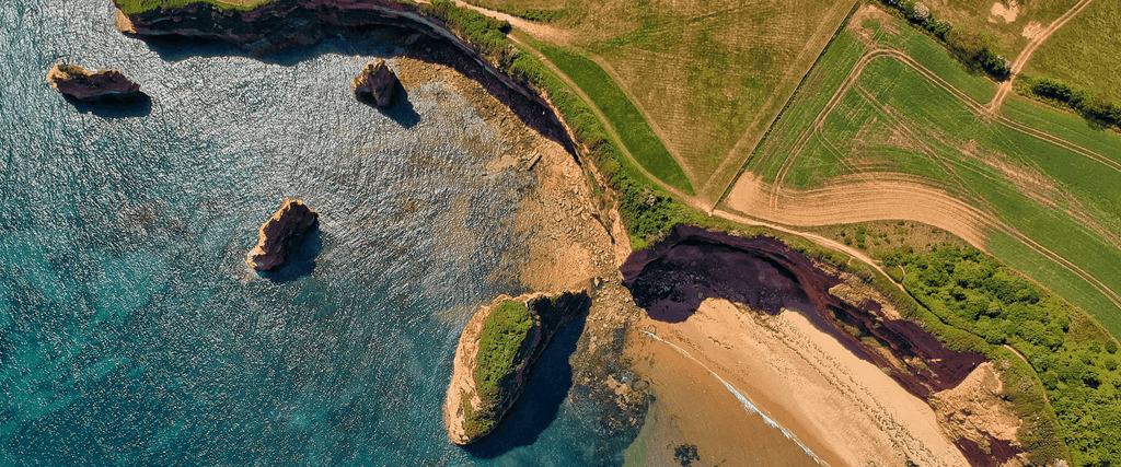 Family enjoying caravan holiday at a sunny holiday park in Devon.