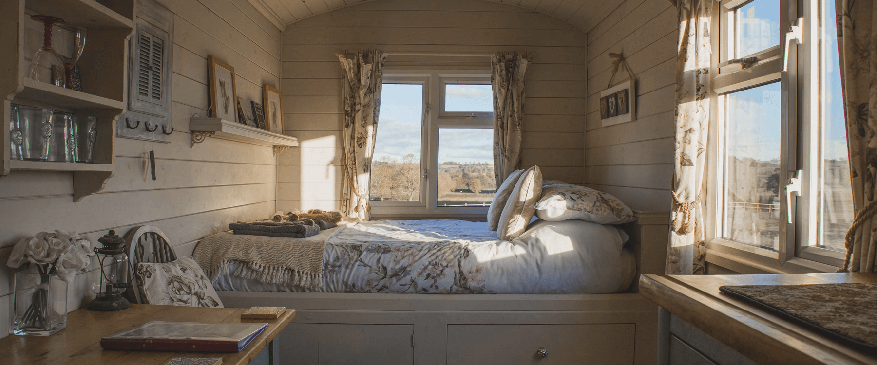 Static caravan holiday home at a sunny caravan park.