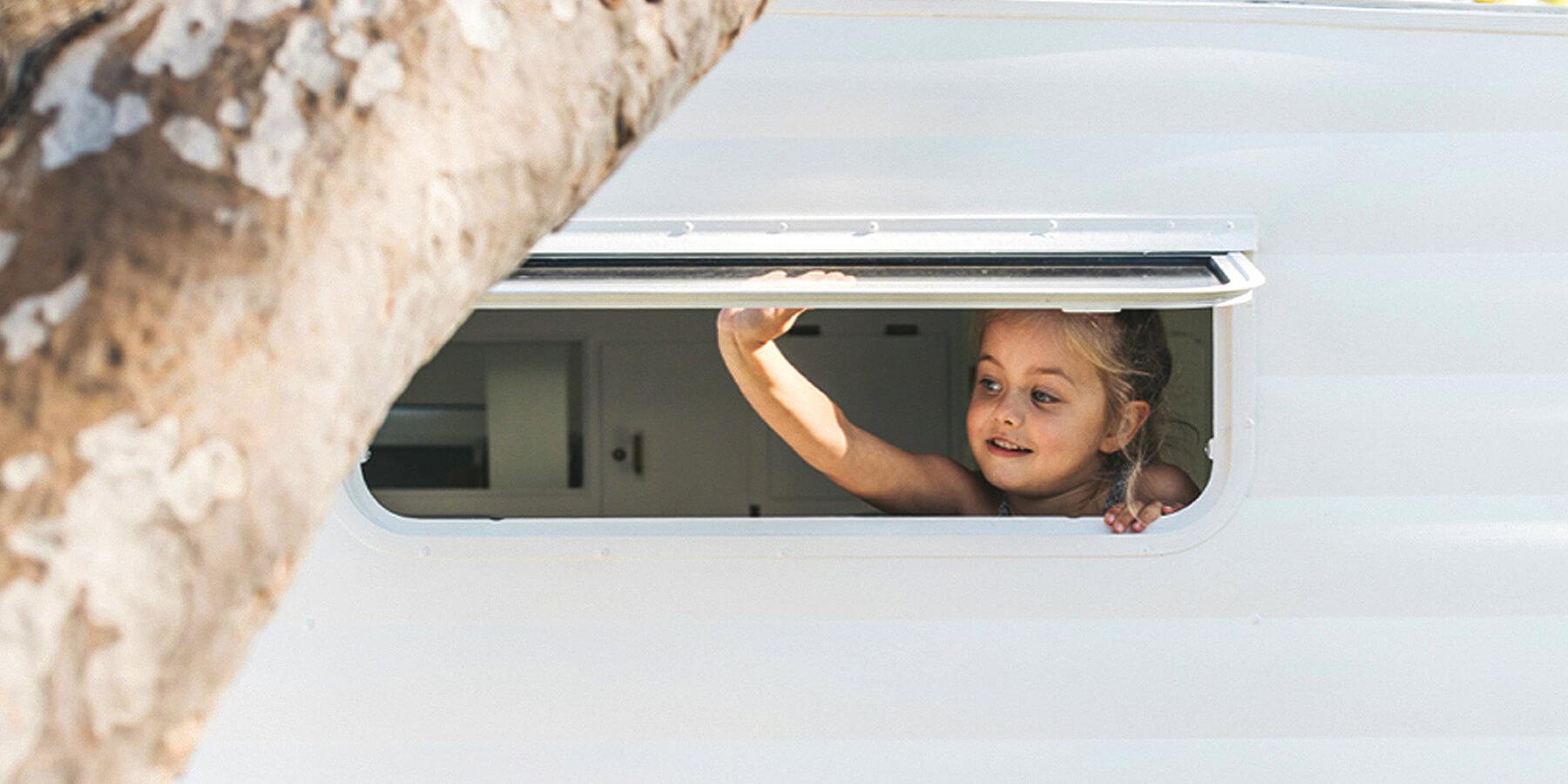 Family road trip: car packed for camping in the Lake District.