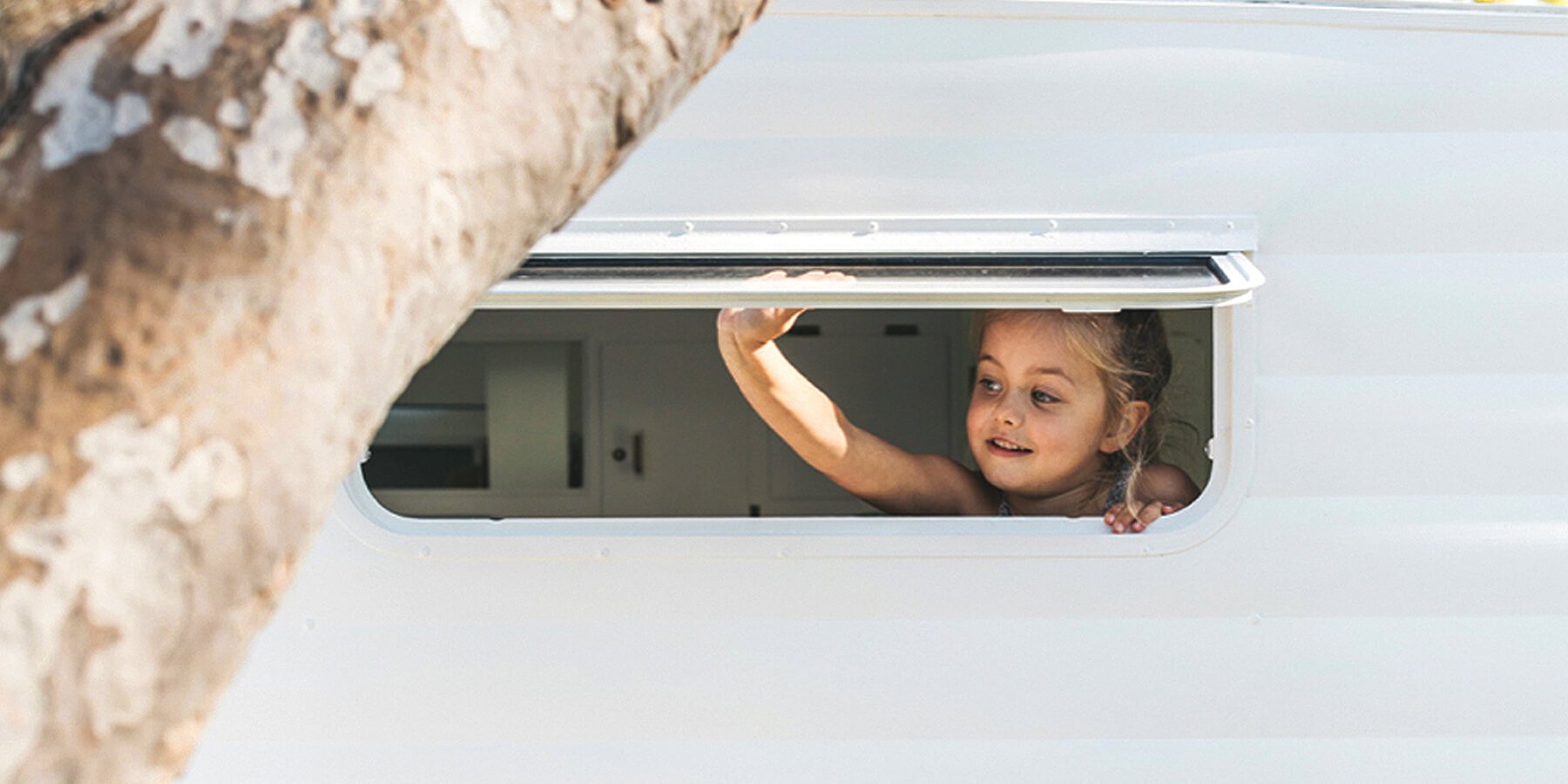 Family road trip: car packed for camping in the Lake District.