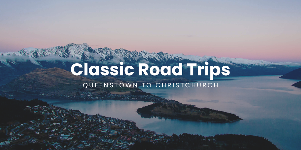 Campervan overlooking Lake Tekapo's turquoise water on a sunny South Island road trip.