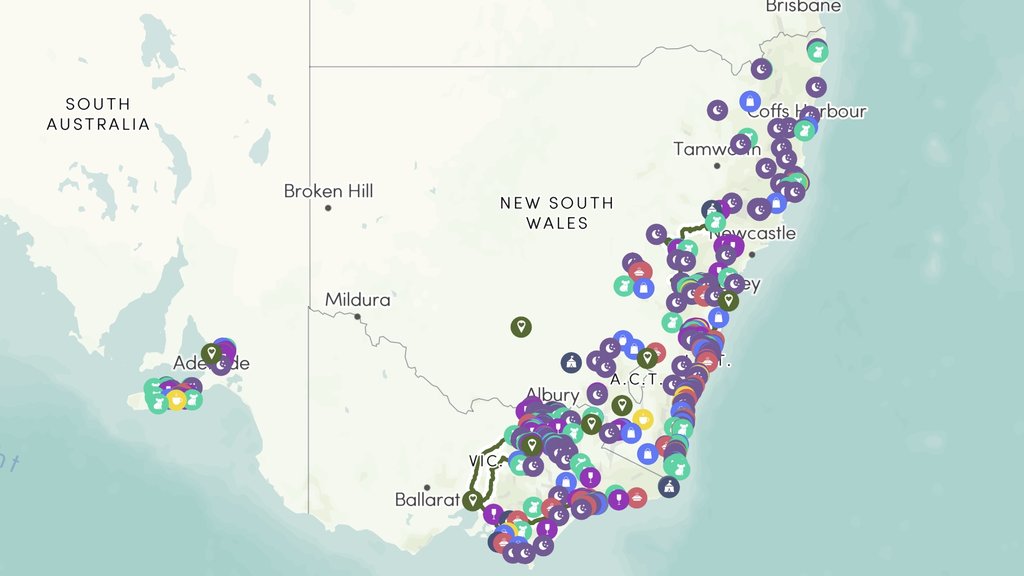 Campervan parked at a scenic lookout, perfect for a road trip through bushfire affected areas.