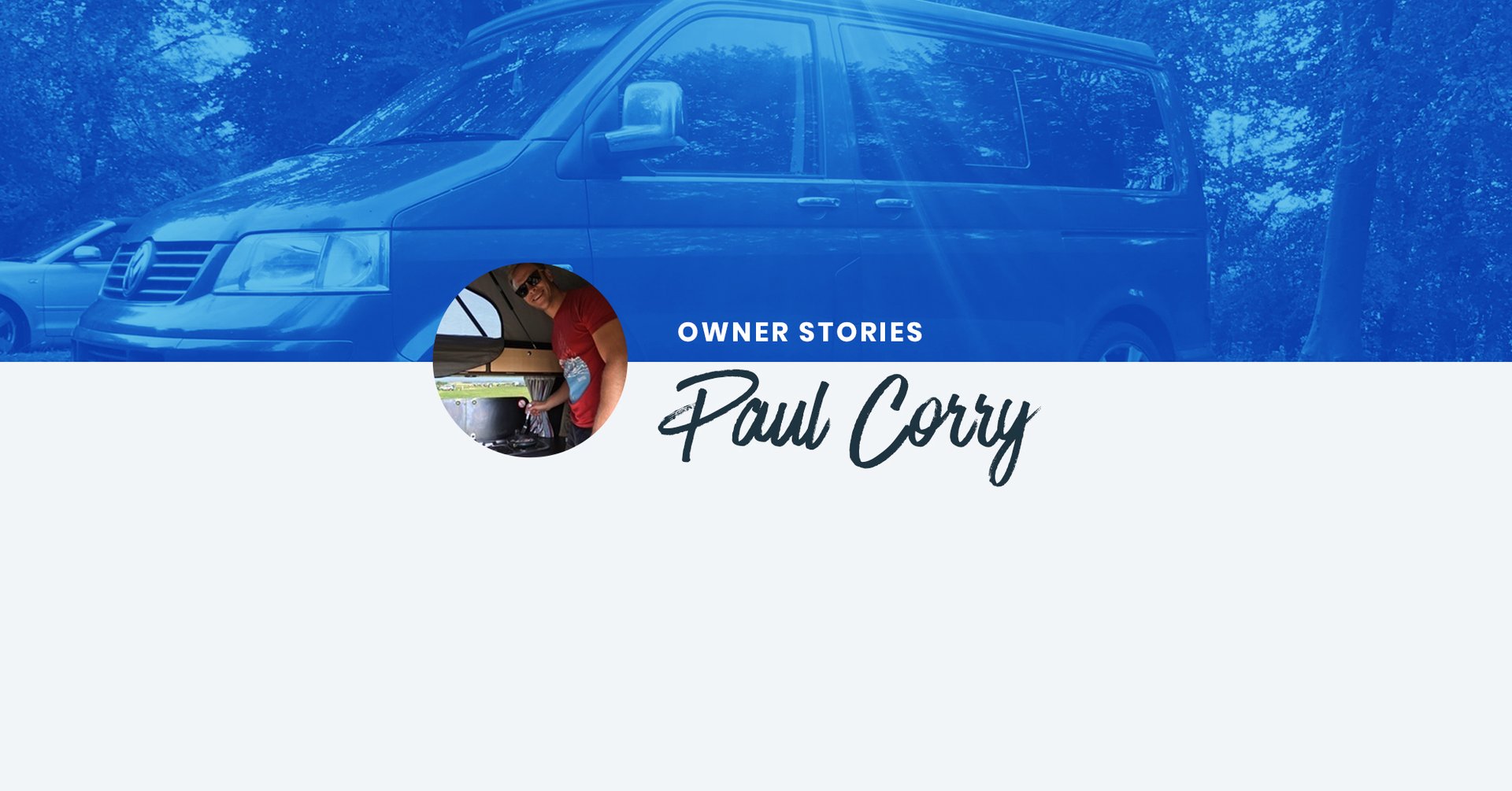 Campervan parked at scenic campsite, trees in background. Couple enjoying a cuppa outside.