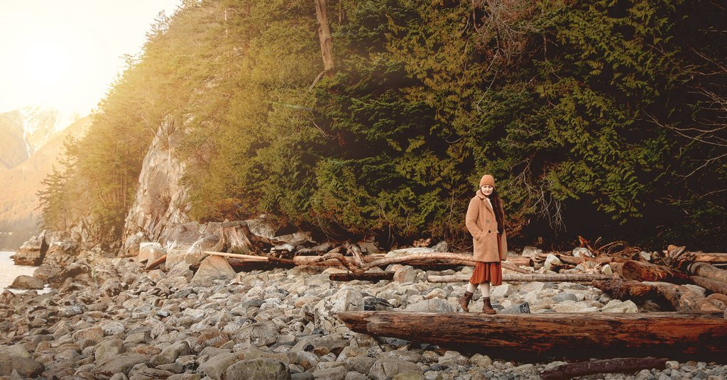 Luxury campervan parked up in an autumn woodland setting, ready for a glamping adventure.