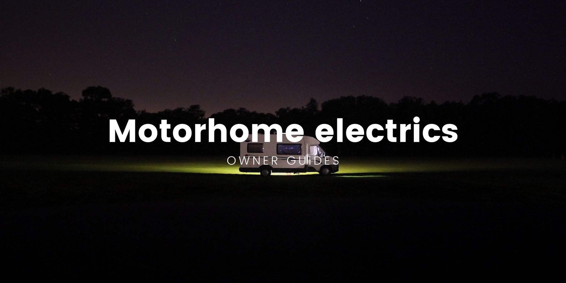 Campervan parked up in the countryside, solar panel on roof. Camping and travel lifestyle.