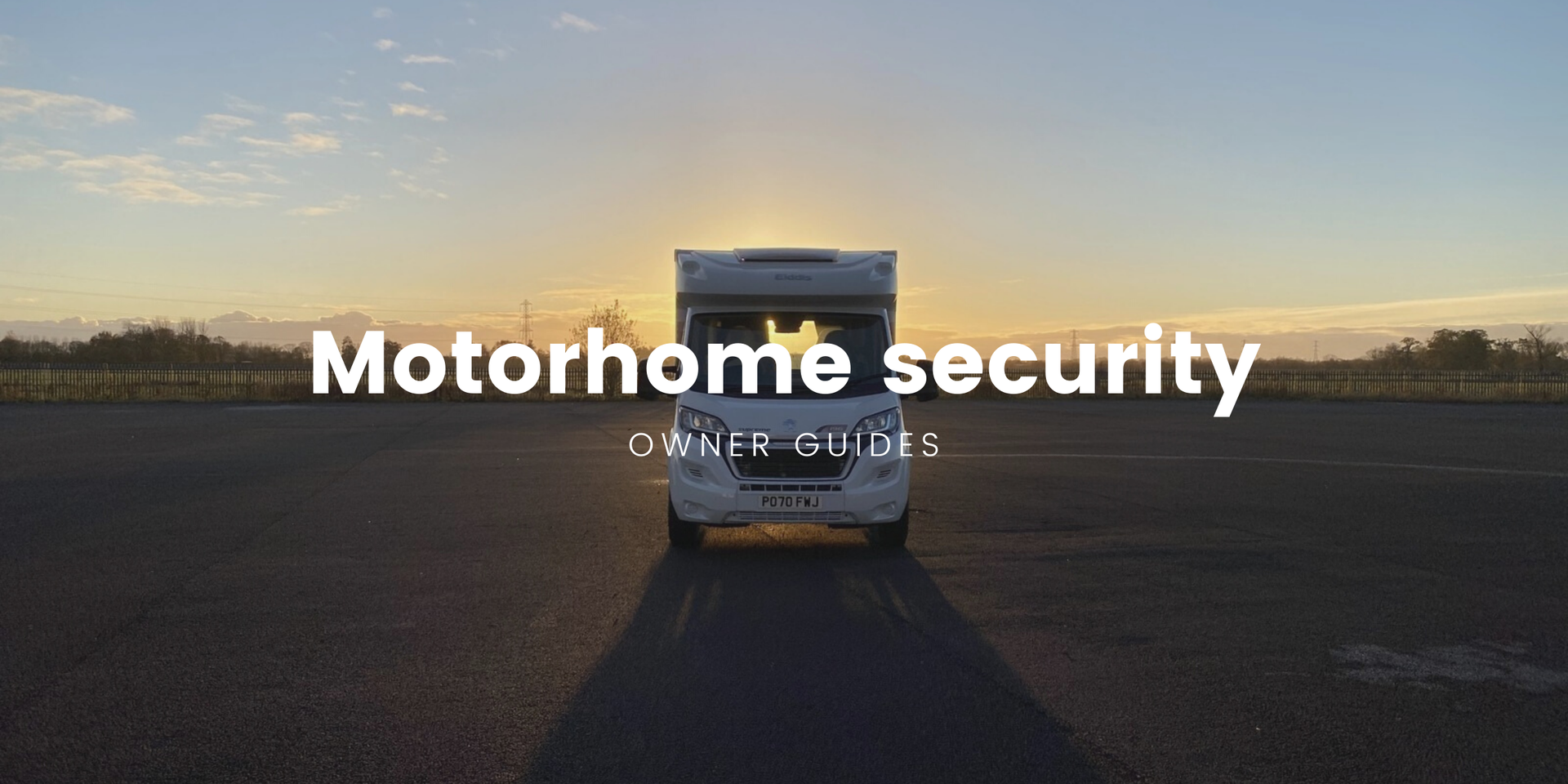 Motorhome parked up at a sunny campsite, suggesting a safe and relaxing camping holiday.