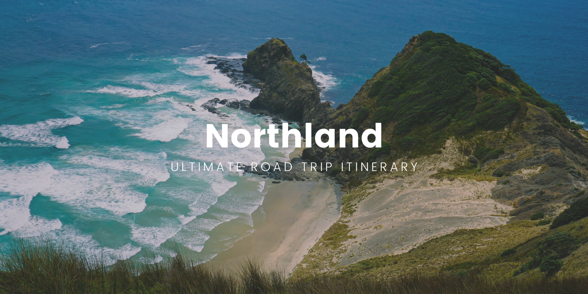 Coastal road curving past turquoise ocean in Northland, Aotearoa. Perfect for a Twin Coast roadie!