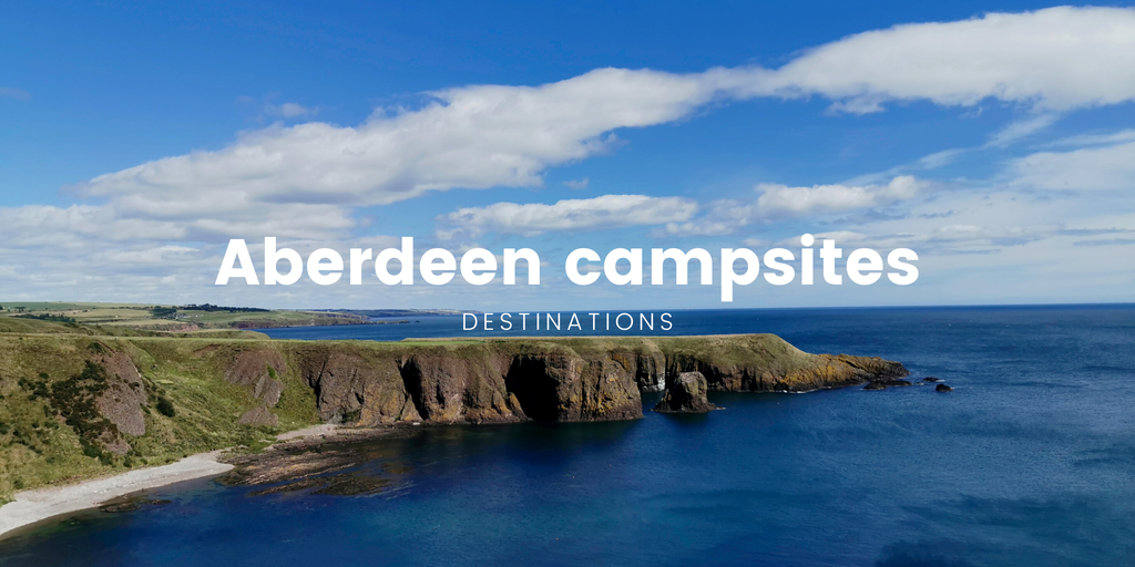 Tents pitched at a scenic campsite, ready for an Aberdeen camping holiday.