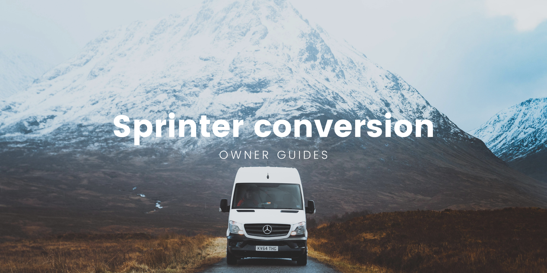 Campervan parked on a clifftop overlooking the sea, ready for a road trip adventure.