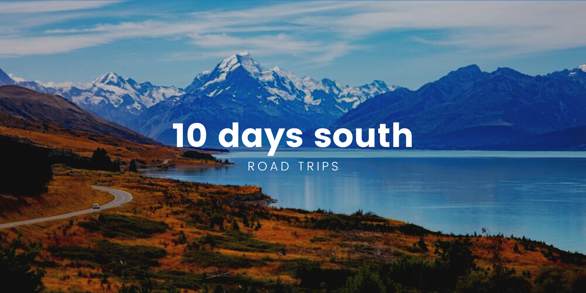 Scenic South Island road trip: campervan overlooking a turquoise lake, snow-capped mountains in the background.