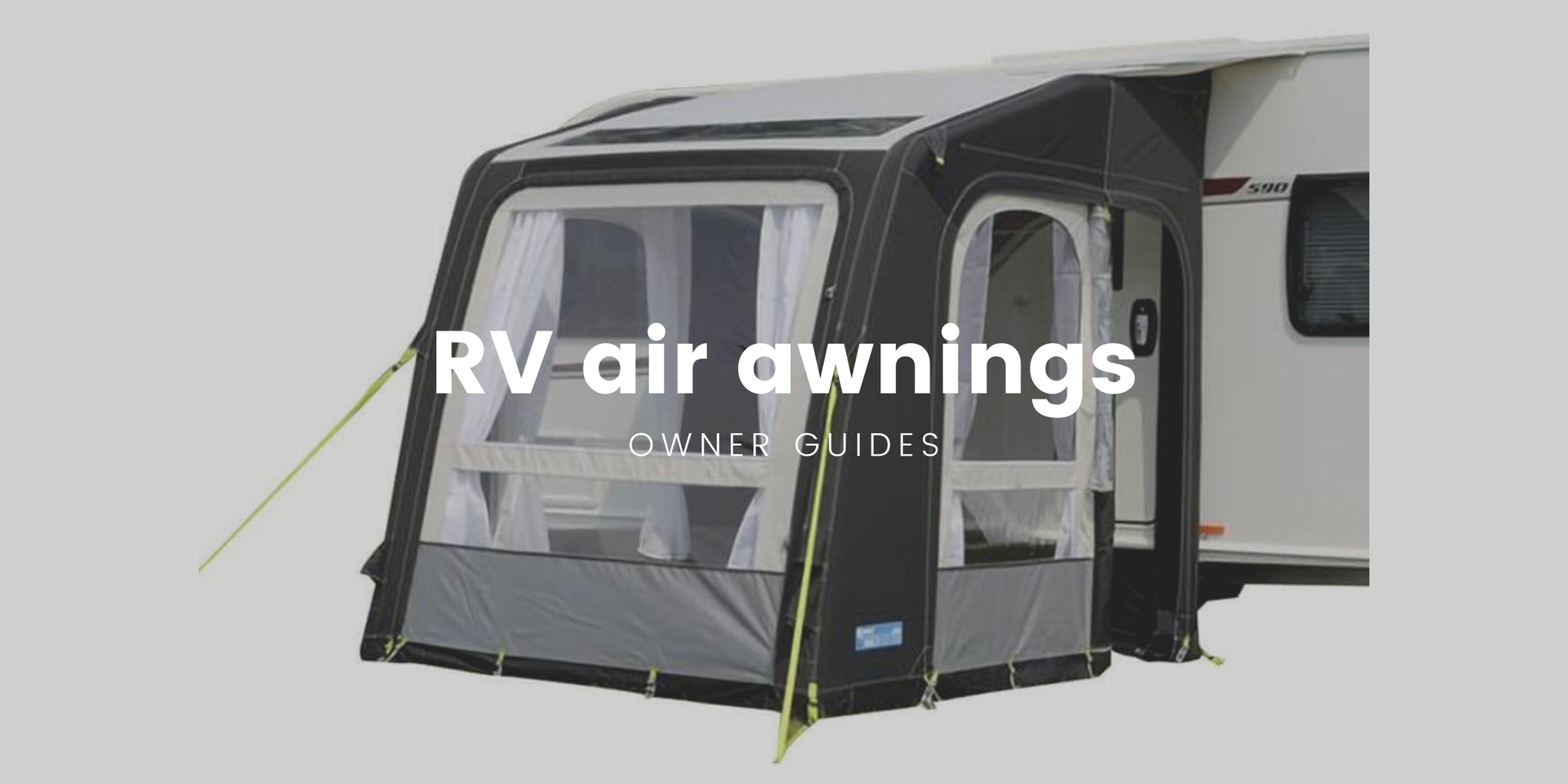 Motorhome with air awning set up at a scenic campground, folks enjoying the outdoors.