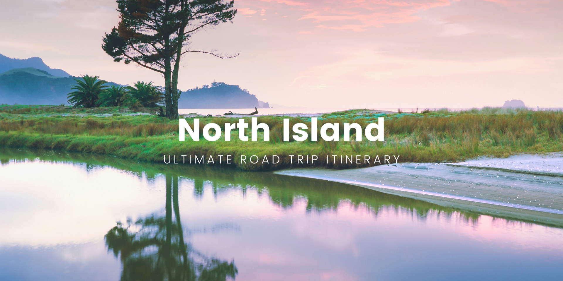 Scenic North Island roadie: campervan overlooking a pristine beach with the sun setting.